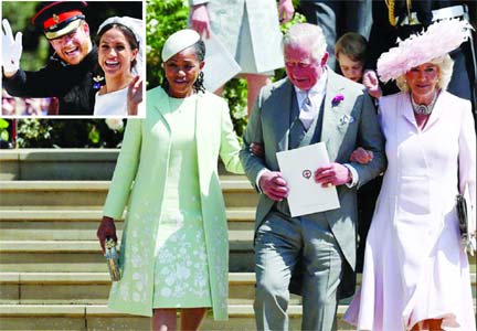 Doria Ragland, mother of the bride, the Prince of Wales Prinu Charles and the Duchess of Cornwall walk down the steps of St George's Chapel in Windsor Castle after the wedding of Prince Harry and Meghan Markle in Windsor, Britain. Internet photo