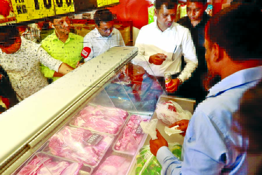 BSTI mobile team led by a magistrate in a drive at 'Swapna' Departmental Store at Banani yesterday fined Tk 10 lakh for selling beef at Tk 550 per KG ignoring City Corporation fixed price Tk 450. This photo was taken on Sunday.