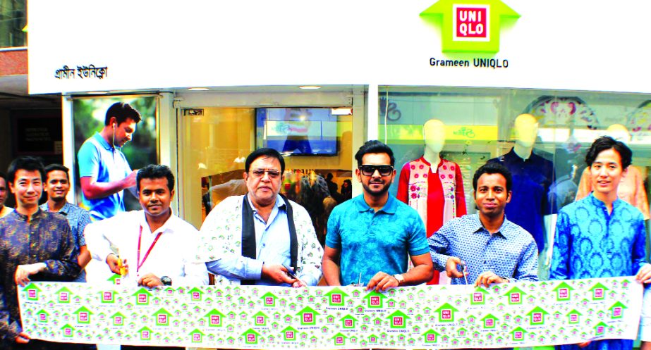 Nazmul Haque, Managing Director of Grameen Uniqlo and Tahsan Khan, Actor and singer, inaugurating its new store at Bailey Road recently.