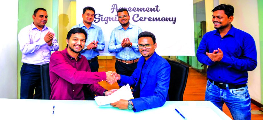 Rezoan Haider, Managing Director of Asian Motorbike Ltd, a distributor of Japanese brand Kawasaki Motorcycle in Bangladesh and Khwaja Azmal Hossain Shakil, Head of Business Development, sign an agreement in the city recently. Under the deal, all marketing