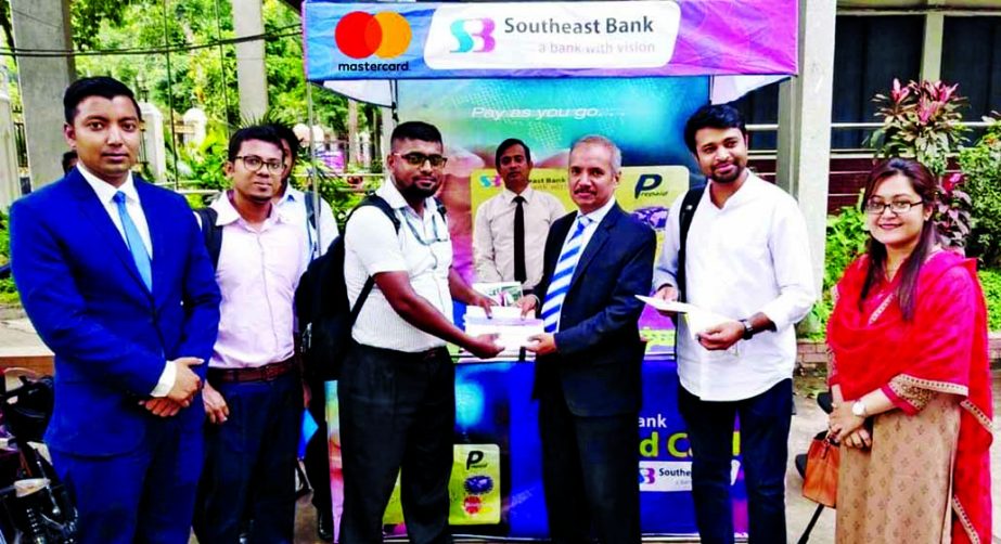 Md. Abdus Sabur Khan, Head of Card of Southeast Bank Limited, inaugurating a 5-day long campaign to issue Prepaid Mastercard to the students of Dhaka University at the campus on Tuesday. During this campaign students of the University would be able to get