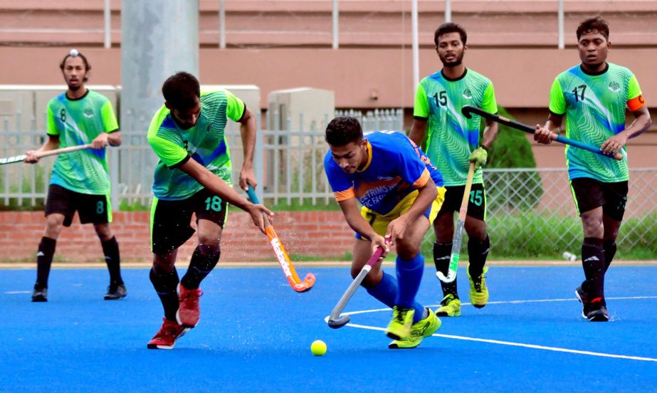 A view of the match of the Green Delta Insurance Premier Division Hockey League between Bangladesh Sporting Club and Dhaka Wanderers Club at the Maulana Bhashani National Hockey Stadium on Tuesday.