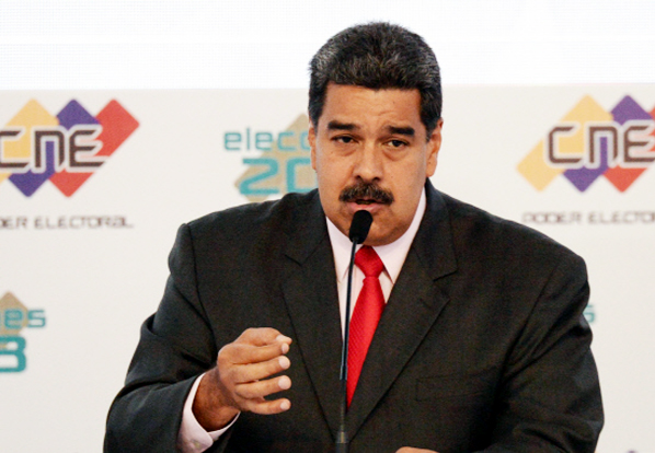 Venezuelan President Nicolas Maduro speaks at the National Electoral Council (CNE) headquarters in Caracas, during the act in which he was proclaimed as re-elected President for the term on Tuesday.