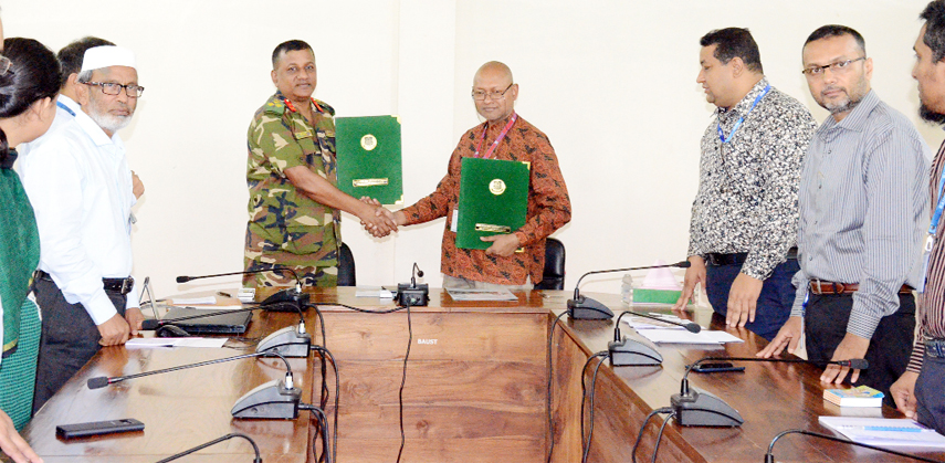 Prof Dr Nazmul Ahsan Kalimullah of Begum Rokeya University, Rangpur and Brigadier General Md Lutfar Rahman of Bangladesh Army University of Science and Technology, Syedpur shaking hands after signing a MoU at the latter's office recently.