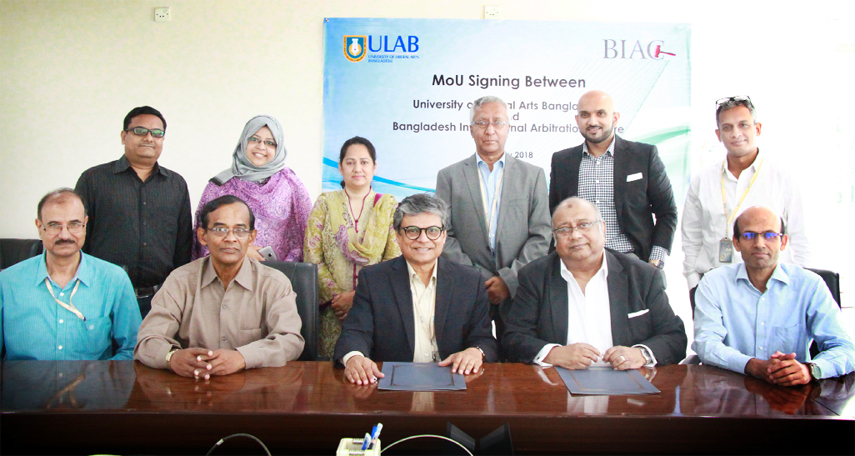Prof Imran Rahman, Special Advisor to the ULAB Board of Trustees and Muhammad A (Rumee) Ali, Chief Executive Officer of BIAC posing for a photo shoot after signing a MoU at ULAB Chancellery at Dhanmondi in the capital on Wednesday.