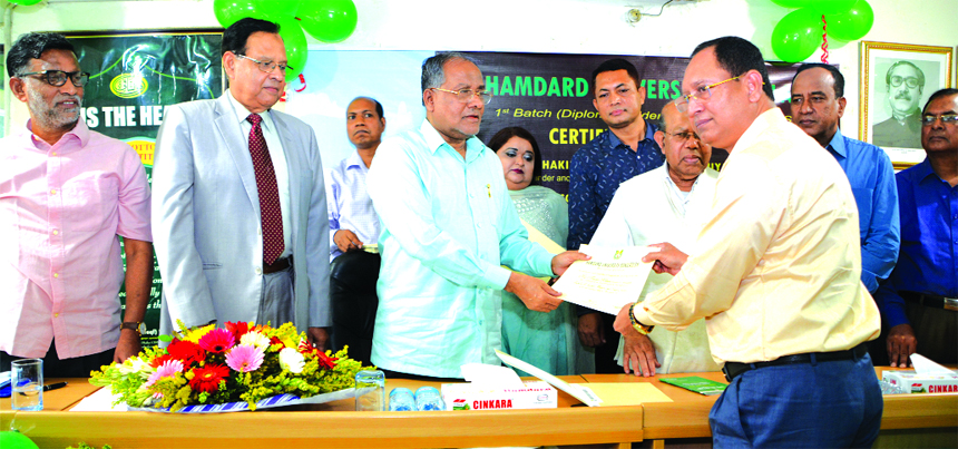 Dr Hakim Md Yousuf Harun Bhuyian, Chief Motwalli and Managing Director of Hamdrad (Waqf) Bangladesh, handing over certificates among the 1st batch students of BUMS and BAMS of Hamdard University at its campus recently. Prof. Dr Abdul Mannan, VC of the Uni