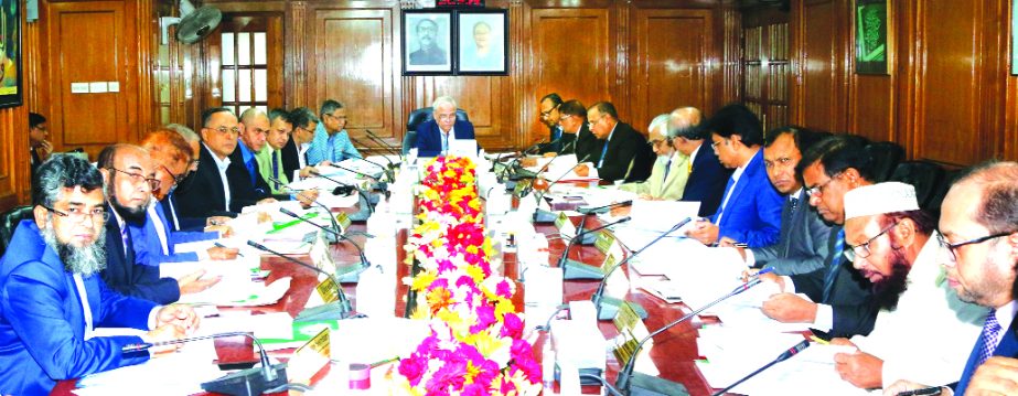 Professor Md. Nazmul Hassan, Ph.D, Chairman of Islami Bank Bangladesh Limited, presiding over the meeting of Board of Directors at the bank's head office on Thursday. Dr. Areef Suleman, representative of Islamic Development Bank , other directors and Md.