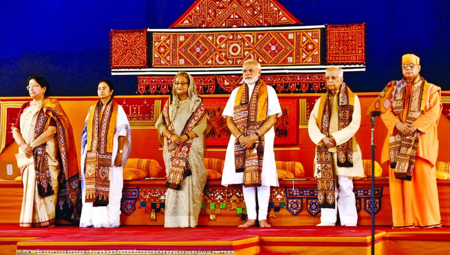 Prime Minister Sheikh Hasina, Indian Prime Minister Narendra Modi, West Bengal Chief Minister Mamata Banerjee in a group photo on arrival at Bishwa Bharati University at Shanti Niketan on Friday flanked by others.