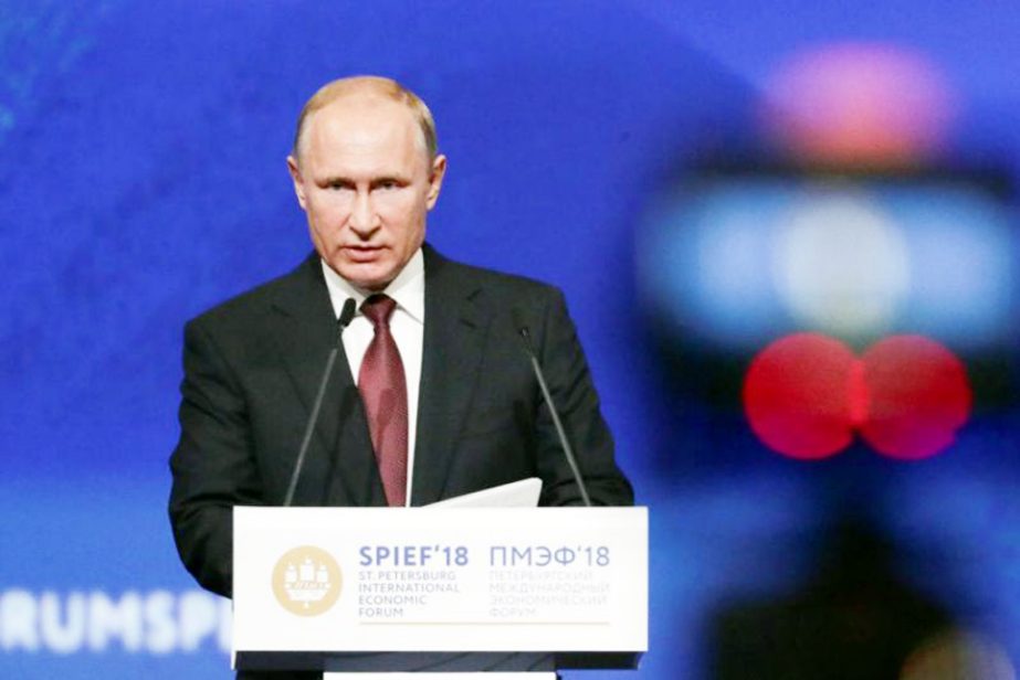 Russian President Vladimir Putin delivers a speech during the St. Petersburg International Economic Forum on Friday.