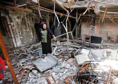 Raghad Hammoudi, who is a member of a group of students campaigning to help rebuild the Central Library of Mosul University, speaks with Reuters, in Mosul.