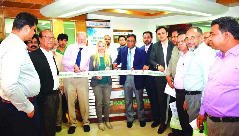 Kamrul Islam, Senior Vice-President of Dhaka Chamber of Commerce and Industry (DCCI), inaugurating , "DCCI Agro Service Desk" at its building on Sunday . Riyadh Hossain, Vice-President, Imran Ahmed and KMN Manjurul Hoque, Directors of the Chamber, re