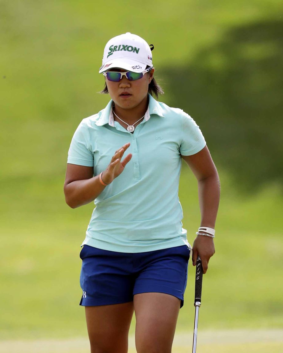 Nasa Hataoka of Japan acknowledges the gallery after her birdie putt on the second green during the third round of the LPGA Volvik Championship golf tournament at the Travis Pointe Country Club in Ann Arbor, Mich on Saturday.