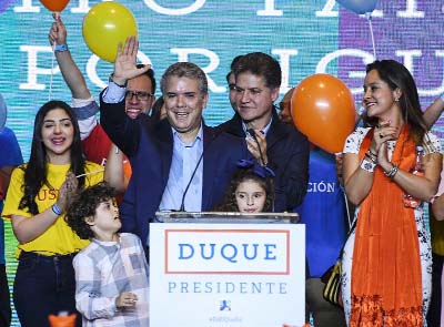 Conservative Colombian presidential candidate Ivan Duque celebrates after his first-round win