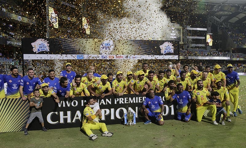 Members of Chennai Super Kings pose with trophy after wining against Sunrisers Hyderabadâ€™s at VIVO IPL cricket T20 final match in Mumbai, India on Sunday.
