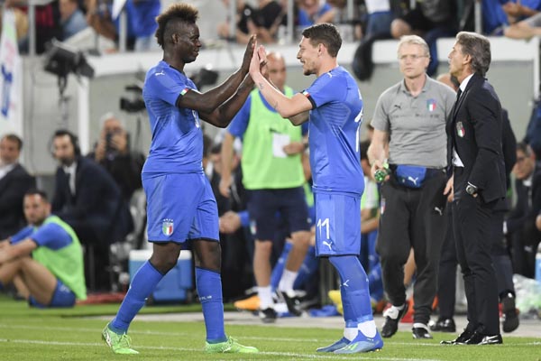 Italy's Mario Balotelli (left) leaves the pitch for Italy's Andrea Belotti during a friendly soccer match between Saudi Arabia and Italy at Kybunpark Stadium in St. Gallen, Switzerland on Monday.
