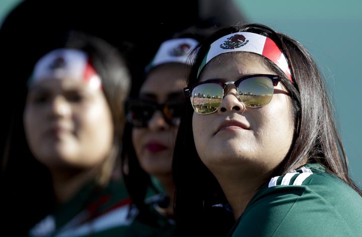 Fans of Mexico watch during the first half of their soccer match against Wales in Pasadena, Calif. on Monday.