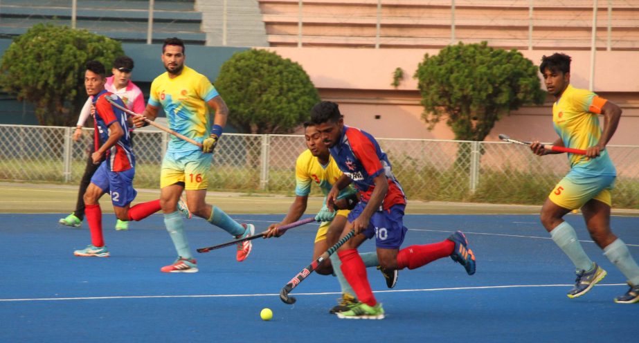 A view of the match of the Green Delta Insurance Premier Division Hockey League between Dhaka Mariner Youngs Club and Dhaka Abahani Limited at the Maulana Bhashani National Hockey Stadium on Tuesday.