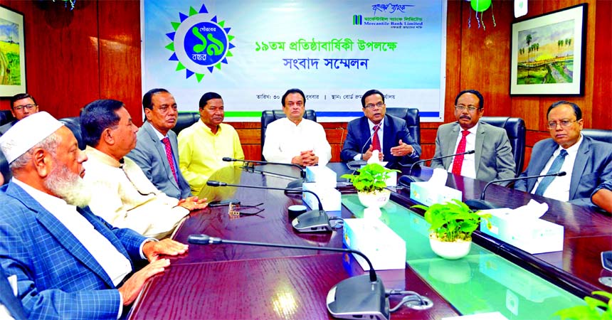 Kazi Masihur Rahman, Managing Director of Mercantile Bank Limited, addressing at a press conference on the occasion of its 19th anniversary at its head office in city on Wednesday. ASM Feroz Alam, Vice-Chairman, M Amanullah, Risk Management Committee Chai