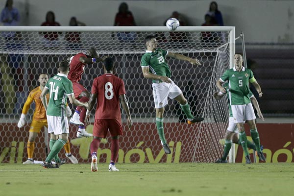 Northern Ireland's Craig Cathcart (20) clears the ball during a friendly soccer match against Panama, in Panama City on Tuesday.