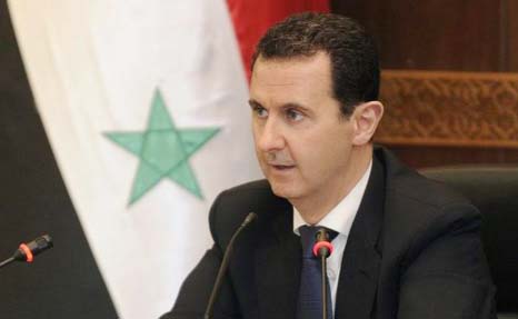 Photo shows Syrian President Bashar al-Assad giving an interview to Greek Kathimerini newspaper in Damascus.
