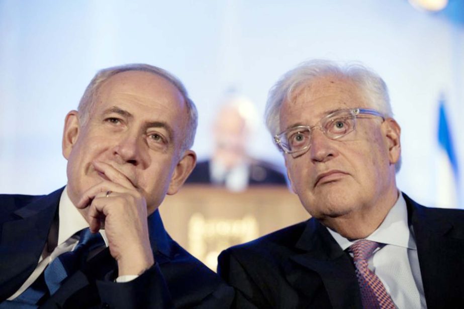 Israeli Prime Minister Benjamin Netanyahu, (left) and David Friedman, (right) the new United States Ambassador to Israel attend a ceremony celebrating the 50th anniversary of the liberation and unification of Jerusalem, in front of the walls of the Old Ci