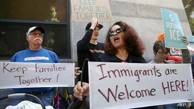 People protest the Trump administration's immigration policies in San Francisco.