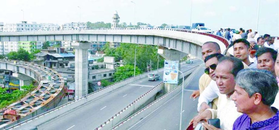 CDA Chairman Abdus Salam along with other officials of CDA and the local Ward Councilors and ruling party leaders visting the traffic movement after inauguration of the flyover loop at Solasahar in the city on Friday.