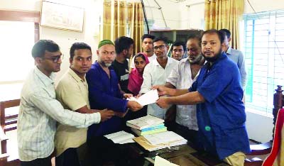 BETAGI (Barguna): Leaders of Anti- Tobacco Organisation placing memorandum to Health and Family Welfare Minister through Shahjahan Kabir, Upazila Parishad Chairman and Md Rajib Ahsan, UNO, Betagi demanding steps to impose 70% tax on tobacco on Thur