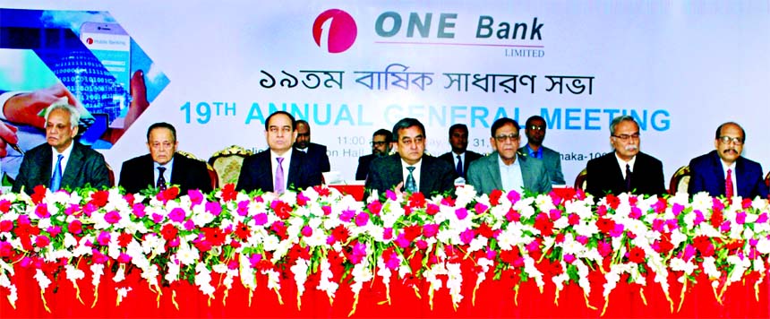 Sayeed H Chowdhury, Chairman, Board of Directors of ONE Bank Limited, presiding over its 19th AGM at a convention hall in the city on Wednesday. The AGM announced 15 percent cash and 5 percent stock dividend. M Fakhrul Alam, Managing Director, Asoke Das G