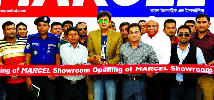 Film actor Amin Khan, Brand Ambassador of Marcel Electric and Electronics inaugurating an exclusive showroom at Ranirbandar of Chirirbandar in Dinajpur on Friday. Mahbubur Rahman Khan, GM of Bangladesh Bank, Humayun Kabir, Executive Director, Dr. Shakhawa