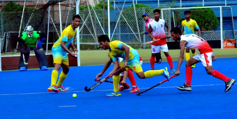 A moment of the Super League match of the Green Delta Insurance Premier Division Hockey League between Dhaka Abahani Limited and Ajax Sporting Club at the Maulana Bhashani National Hockey Stadium on Saturday.