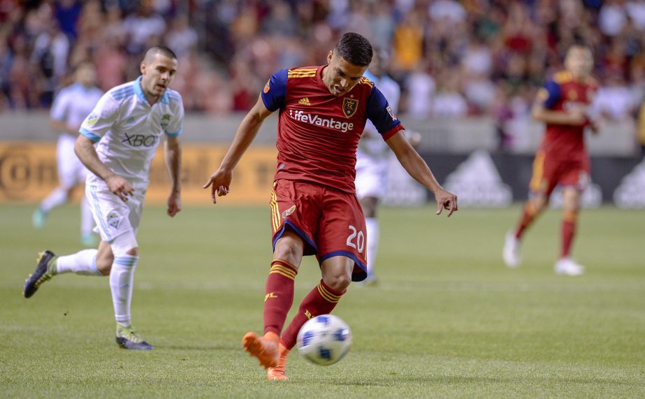 Real Salt Lake midfielder Luis Silva (20) scores against the Seattle Sounders during the second half of an MLS soccer match in Sandy, Utah on Saturday.