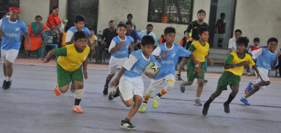 A view of the match of the Diamond Melamine Under-8 Kids Rugby League between Farashganj Sporting Club and Azad Sporting Club at the Shaheed (Captain) M Mansur Ali National Handball Stadium on Sunday.