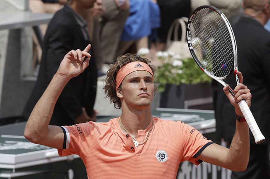 Germany's Alexander Zverev celebrates scoring a point against Russia's Karen Khachanov during their fourth round match of the French Open tennis tournament at the Roland Garros stadium in Paris, France on Sunday.