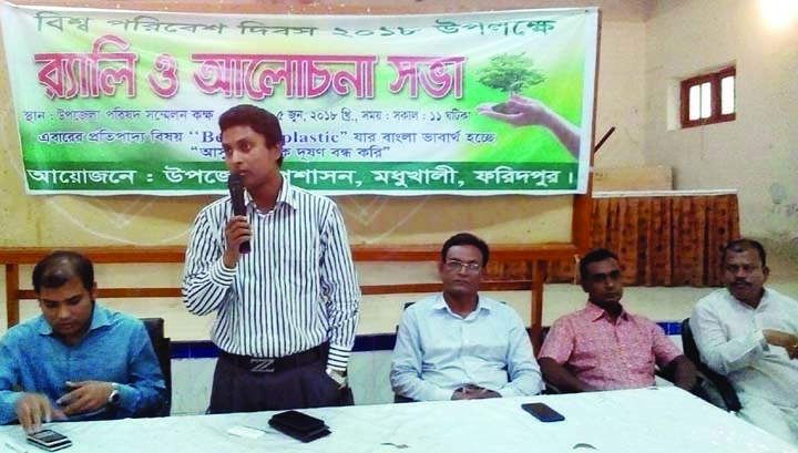 MADHUKHALI(Faridpur): Md Mustafa Monowar, UNO, Madhukhali Upazila speaking at a discussion meeting on the occasion of the World Environmnet Day yesterday.