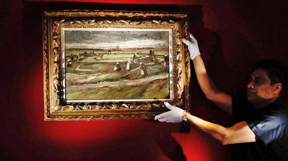 The painting "Raccommodeuses de filet dans les dunes"" (Women Mending Nets in the Dunes) by late Dutch artist Vincent Van Gogh is presented at Artcurial auction house in Paris."