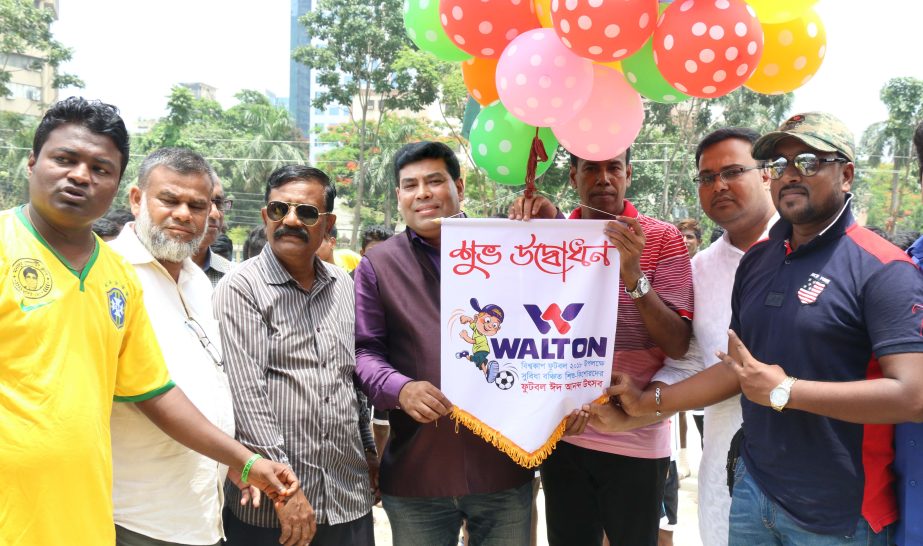 Senior Operative Director (Head of Games & Sports Department) of Walton Group FM Iqbal Bin Anwar Dawn inaugurating the Walton football tournament for under privileged children by releasing the balloons as the chief guest at the Paltan Maidan on Tuesday.