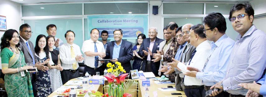 A view of the signing ceremony of a MoU between Southeast University, Bangladesh and Yunnan University of Finance and Economics, China held on Wednesday in the capital.