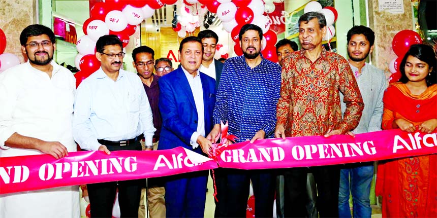KM Mozibul Hoque, Chairman of Alfa Style Ltd, inaugurating its second fashion wears outlet at Police Plaza Concord, Gulshan Avenue in the city on Tuesday. S AM Yousuf, Managing Director, Kazi Shah Muzakker Ahmedul Hoque, Director and other employees of th