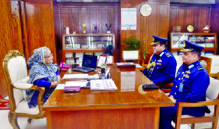 Outgoing Air Chief Air Marshal Abu Esrar and newly appointed Air Chief Air Vice Marshal Masihuzzaman Serniabat called on Prime Minister Sheikh Hasina at the latter's Jatiya Sangsad Bhaban office on Wednesday. PID photo