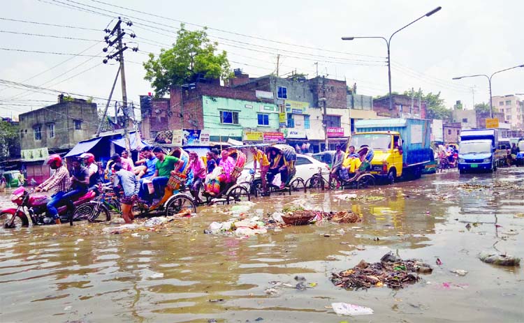 Due to inadequate drainage system, city's Kalshi area in Mirpur is inundated by rain water. This picture was taken on Thursday.