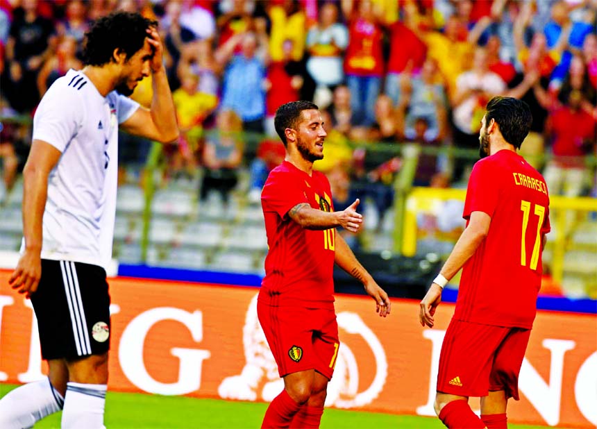 Belgium's Eden Hazard (center) is congratulated by teammate Belgium's Youri Tielemans after he scored his sides second goal during a friendly soccer match between Belgium and Egypt at the King Baudouin stadium in Brussels on Wednesday.