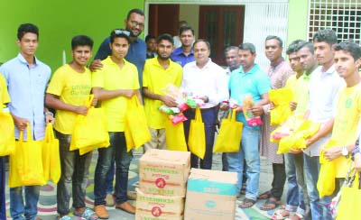 PATUAKHALI: Md Masumur Rahman, DC, Patuakhali handing over food items of Eid for poor children of Char areas at a function recently.