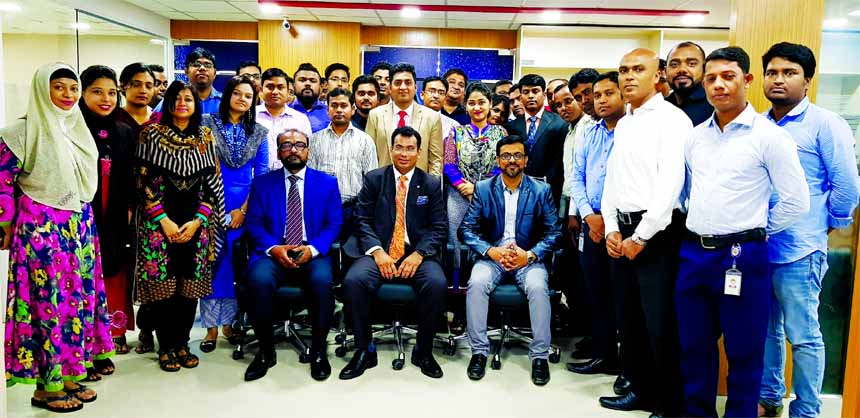 Imran Ahmed, Chief Operating Officer of NRB Bank Limited, poses for a photograph with the participants of a day-long training programme on "Prevention of Money Laundering and Terrorist Financing" at the bank's Institute of Learning and Development in t