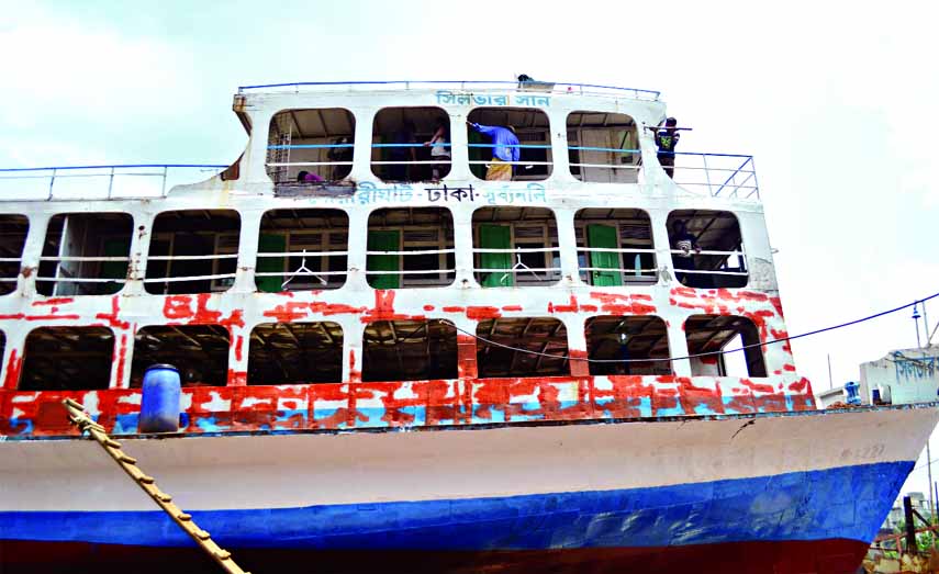 A section of unholy persons engaged in repairing old launch for plying ahead of Eid-ul-Fitr. The snap was taken from Keraniganj Dockyard on Saturday.