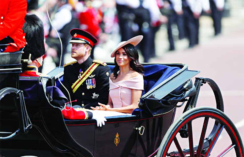 Britain's Prince Harry and Meghan, Duchess of Sussex, take part in the Trooping the Colour parade in central London on Saturday.