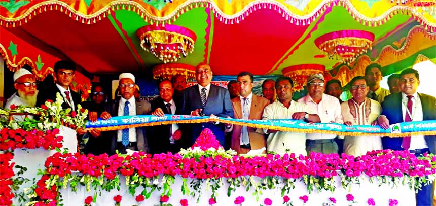 Syed Waseque Md Ali, Managing Director of First Security Islami Bank Limited, inaugurating its new branch at Kalia in Narail on Sunday. SM Nazrul Islam, Head of General Services Division, Md. Abdur Rashid, Khulna Zonal Head of the bank and local elites we