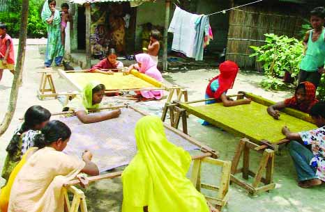 ISHWARDI: Students of Schools and colleges at Ishwardi Banarasi Palli are engaging in embroidery works ahead of Eid. This snap was taken on Sunday.