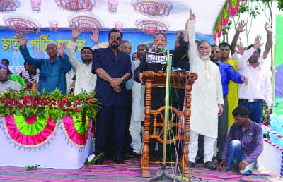 ULIPUR (Kurigram): Former President Hussain Muhammad Ershad and Chairman Jatiya Party(JP) introducing Prof Dr Akkas Ali Sarkar as JP nominated candidate in by- election from Kurigram- 3 constituency at a meeting at Ulipur Stadium on Sunday.