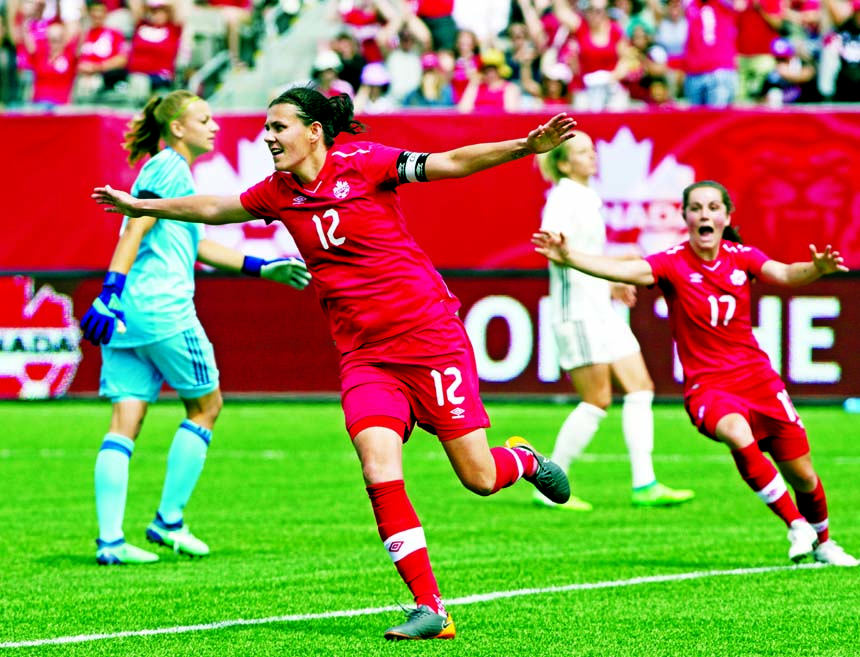 Canada's Christine Sinclair celebrates after scoring against Germany during the second half of women's soccer action at Tim Hortons Field in Hamilton, Ontario, Canada on Sunday.